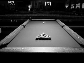 People playing with ball on table