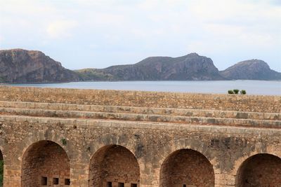 View of historical building against cloudy sky