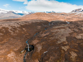 Aerial view of the svartifoss waterfall surrounded by basalt columns