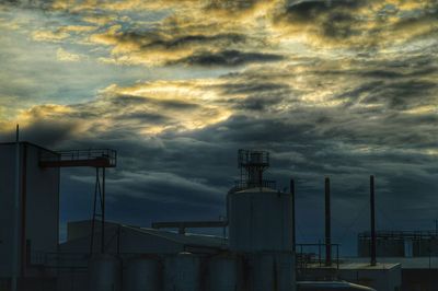 Low angle view of cloudy sky at sunset