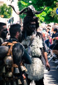 Statue on street in city