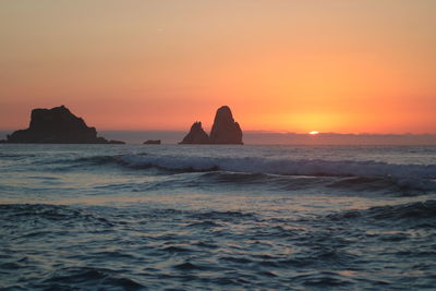 Scenic view of sea against sky during sunset