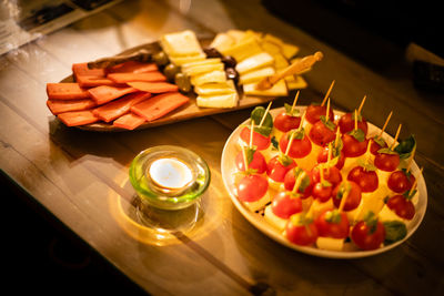 High angle view of fruits in plate on table