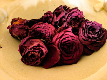 Close-up of roses on table