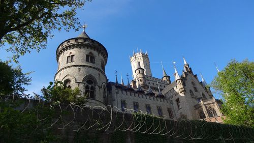 Low angle view of historic building against sky