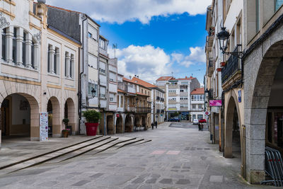 Street amidst buildings in city