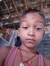 Close-up portrait of boy looking down