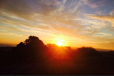 Scenic view of sunset over landscape