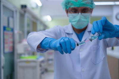 Midsection of senior man working