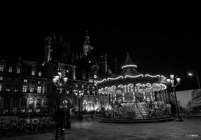 WOMAN IN CITY AT NIGHT