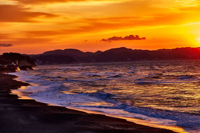 Scenic view of sea against sky during sunset