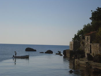 Scenic view of sea against clear sky