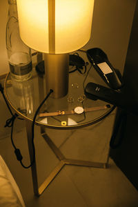 High angle view of illuminated lamp on table at home