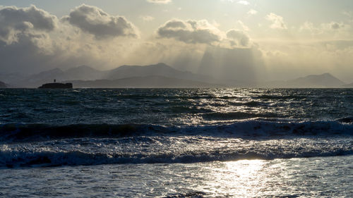 View of sea against cloudy sky