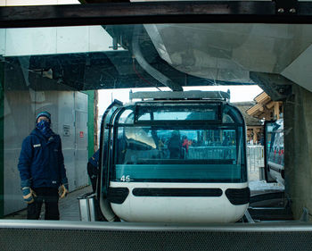 Rear view of people in train