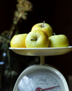 Close-up of apples in container