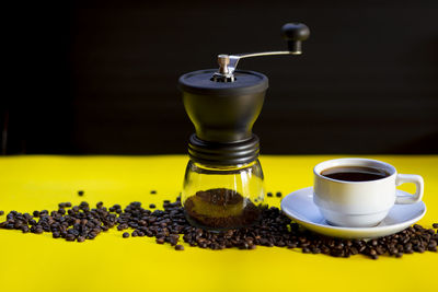 Close-up of coffee cup on table