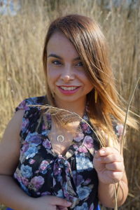 Portrait of smiling young woman