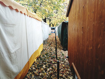 Panoramic view of railroad tracks amidst trees and buildings