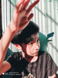 Close-up portrait of boy at home