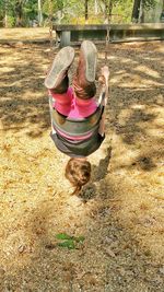 View of girl on swing