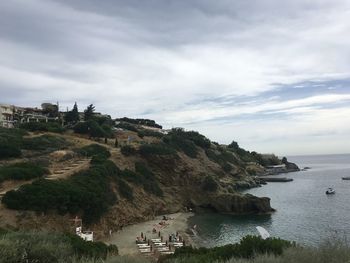 Scenic view of sea against cloudy sky