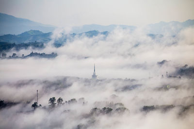 Scenic view of clouds over mountain