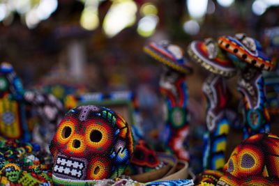 Close-up of toys for sale at market stall