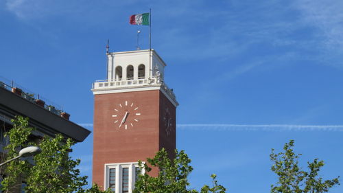 Low angle view of built structure against blue sky