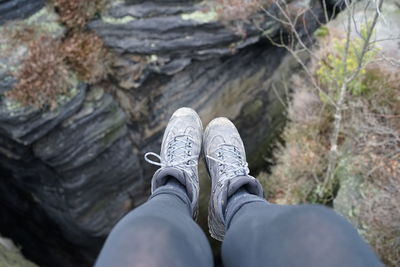 Low section of person on rock