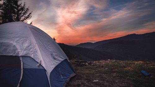 Scenic view of mountains against sky during sunset