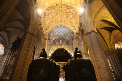 Low angle view of illuminated ceiling of building