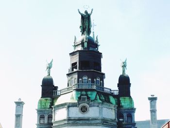 Low angle view of statue of liberty against sky