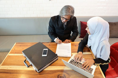 Men working on table