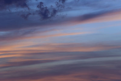 Low angle view of clouds in sky during sunset