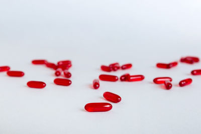 Close-up of pills on white background