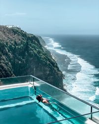 High angle view of swimming pool in sea against sky