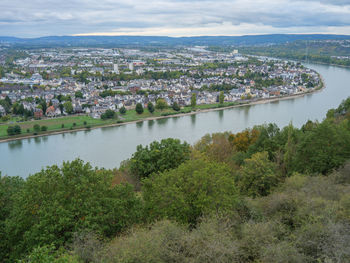 High angle view of river amidst buildings in city