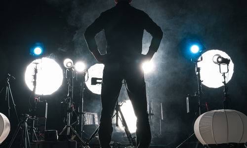 Low angle view of man standing in music concert