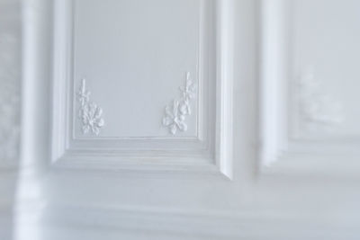 Close-up of white door