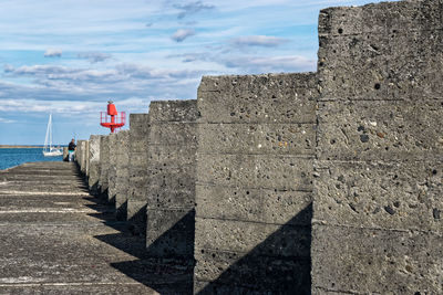 Footpath by concrete walls