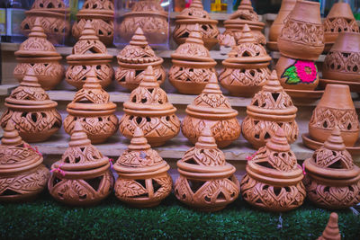 Various earthenware for sale at market stall