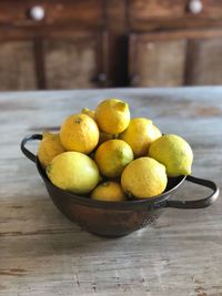 Close-up of fruits in bowl on table