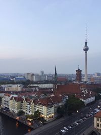 High angle view of houses and city road with oriental pearl tower in background