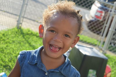 Close-up portrait of smiling boy