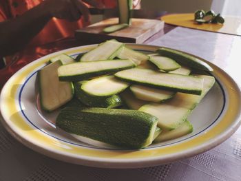 High angle view of chopped vegetables in bowl on table