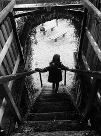 Full length of man standing on steps