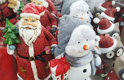 Close-up of christmas decorations in snow