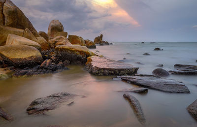 Scenic view of sea against sky during sunset