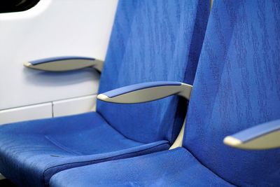 Close-up of blue seat